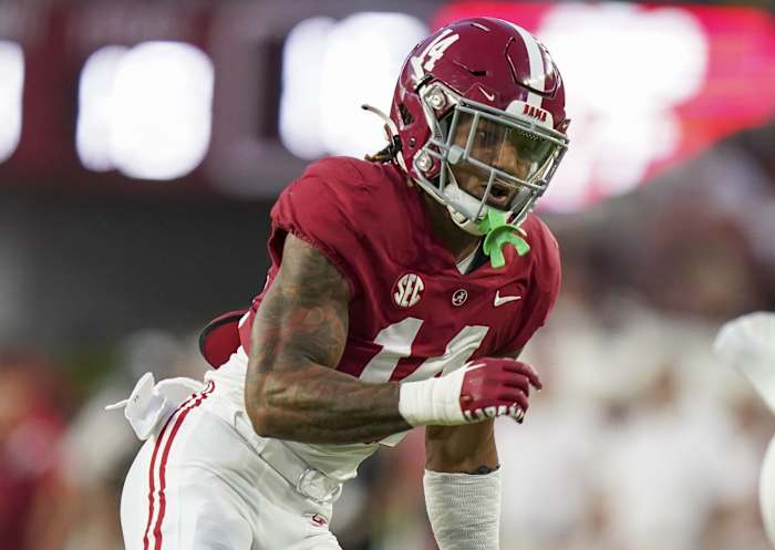 Alabama Crimson Tide defensive back Brian Branch (14) pursues Vanderbilt Commodores running back Ray Davis (2) during the first half at Bryant-Denny Stadium.